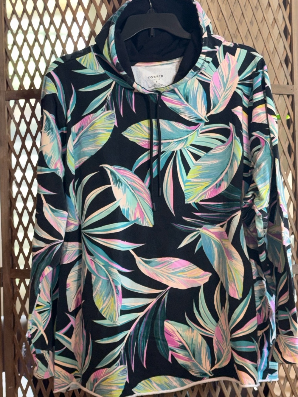 Torrid Pullover Black Hoodie with Pastel Tropical Leaf Print - Picture 2 of 6
